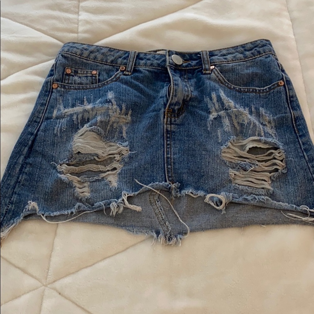 Denim skirt with rips